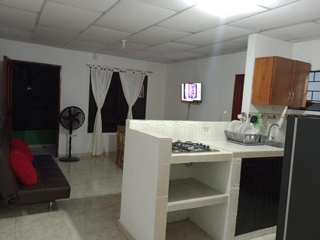 Kuchyň nebo kuchyňský kout v ubytování Apartamentos Poseidon