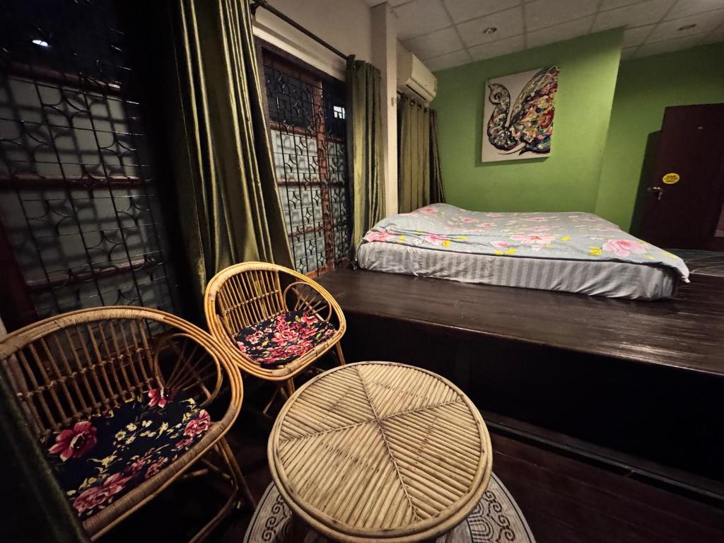 Postel nebo postele na pokoji v ubytování Villa’s Homestay