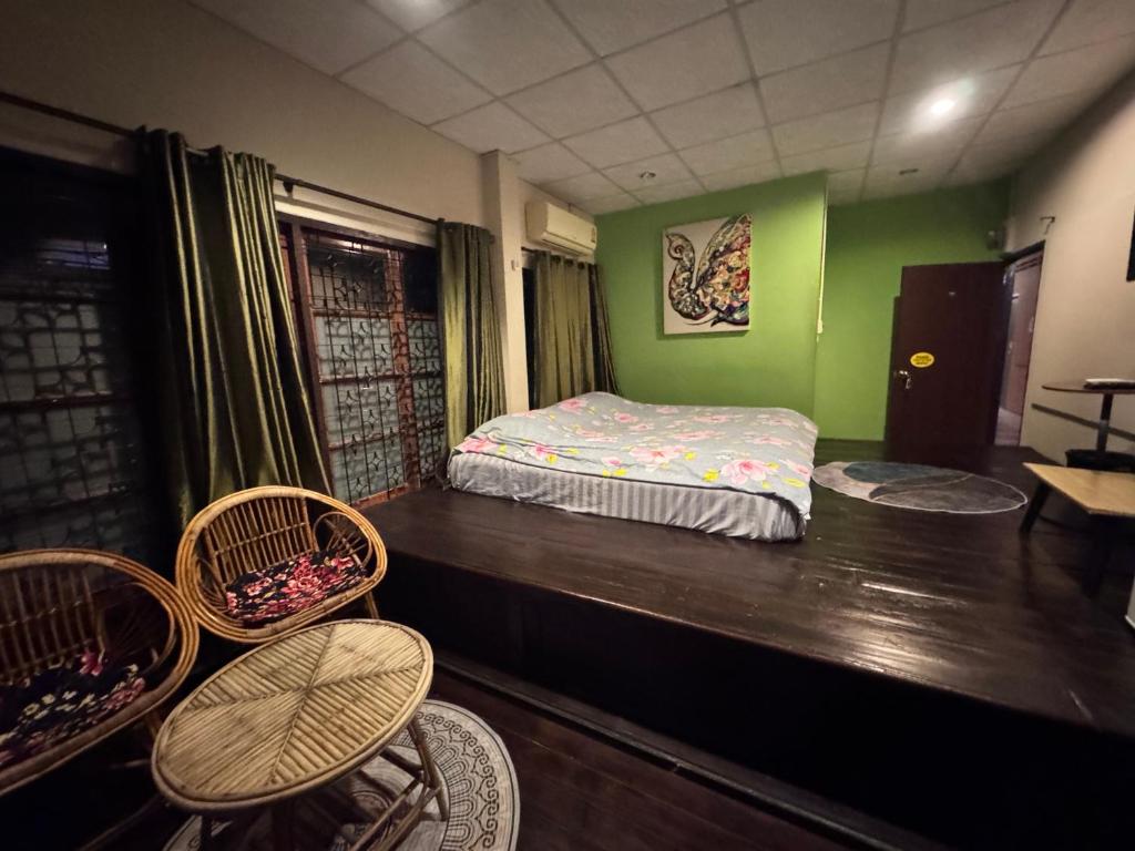Postel nebo postele na pokoji v ubytování Villa’s Homestay