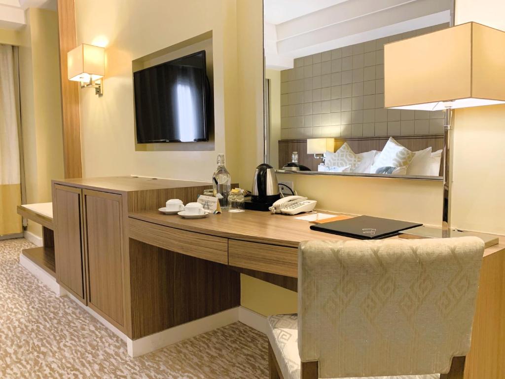 TV a/nebo společenská místnost v ubytování Hotel Benilde Maison De La Salle