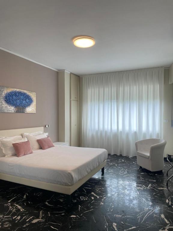 Postel nebo postele na pokoji v ubytování Hotel Lis