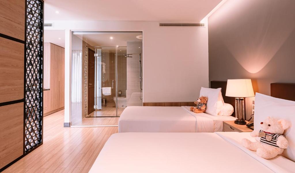 Premium Deluxe Twin Room with Balcony with Free Herbal Foot Bath 15 mins