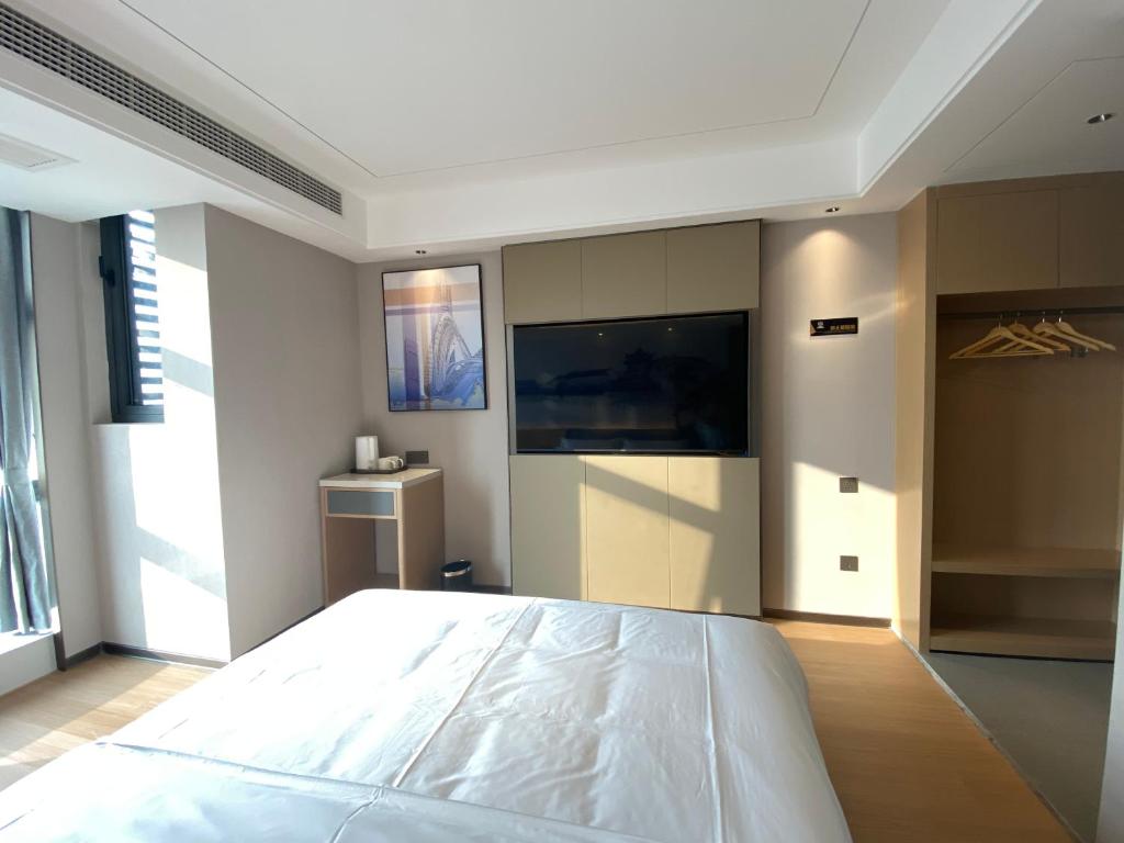 Fotografie z fotogalerie ubytování Yilong Michael International Hotel Suzhou Industrial Park Nanhuanqiao Market Branch v destinaci Jiangtian