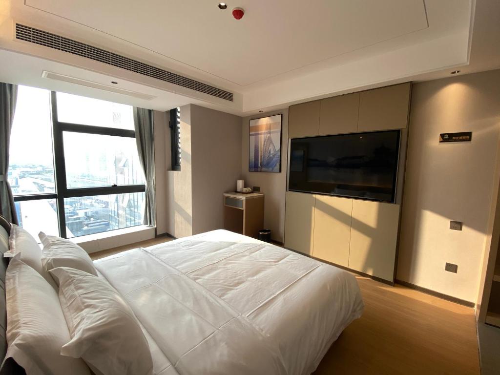 Fotografie z fotogalerie ubytování Yilong Michael International Hotel Suzhou Industrial Park Nanhuanqiao Market Branch v destinaci Jiangtian