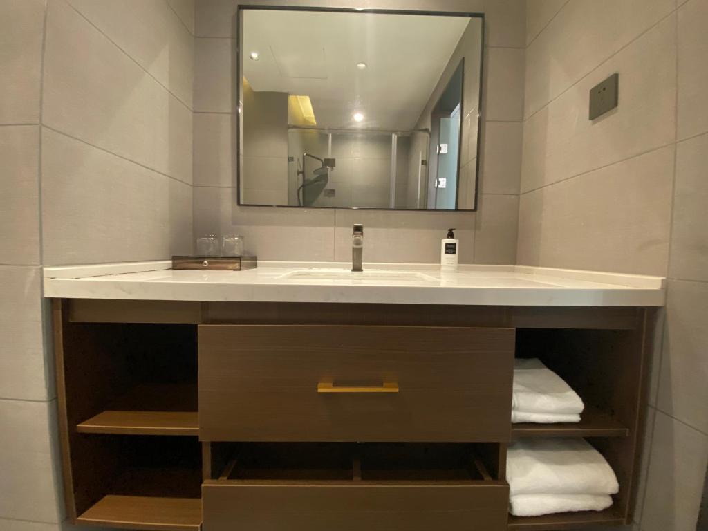 Fotografie z fotogalerie ubytování Yilong Michael International Hotel Suzhou Industrial Park Nanhuanqiao Market Branch v destinaci Jiangtian