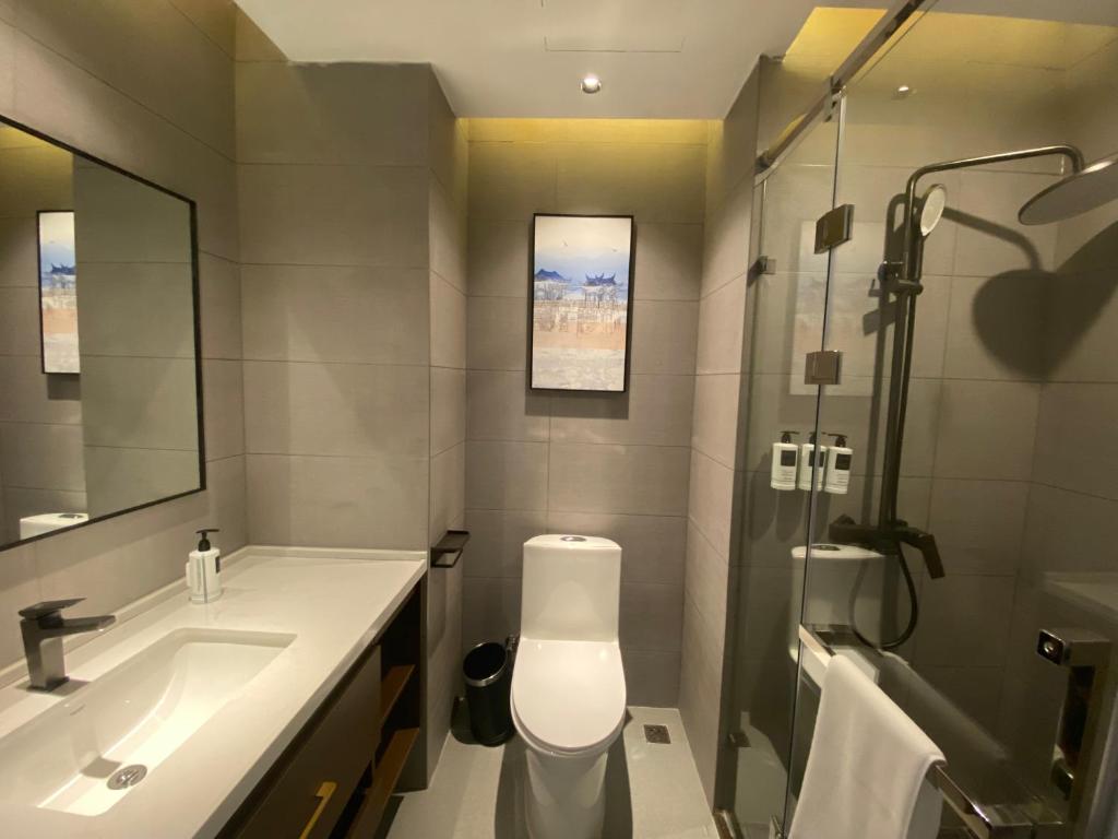 Fotografie z fotogalerie ubytování Yilong Michael International Hotel Suzhou Industrial Park Nanhuanqiao Market Branch v destinaci Jiangtian