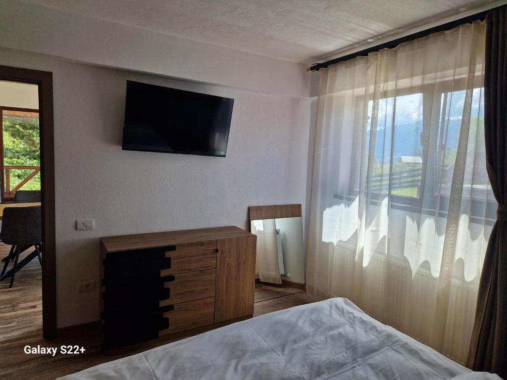 Postel nebo postele na pokoji v ubytování Transylvanian Views