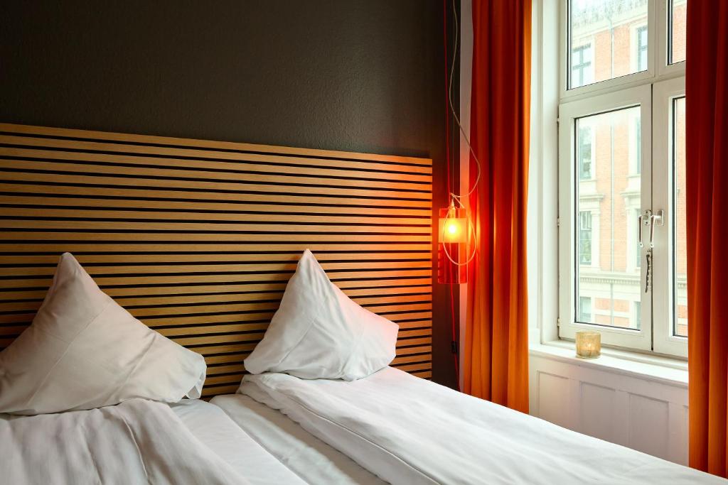 Postel nebo postele na pokoji v ubytování Annex Copenhagen