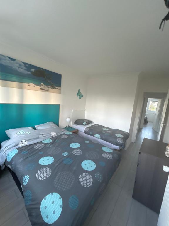 Postel nebo postele na pokoji v ubytování Appartement cosy ligne 11 proche Paris