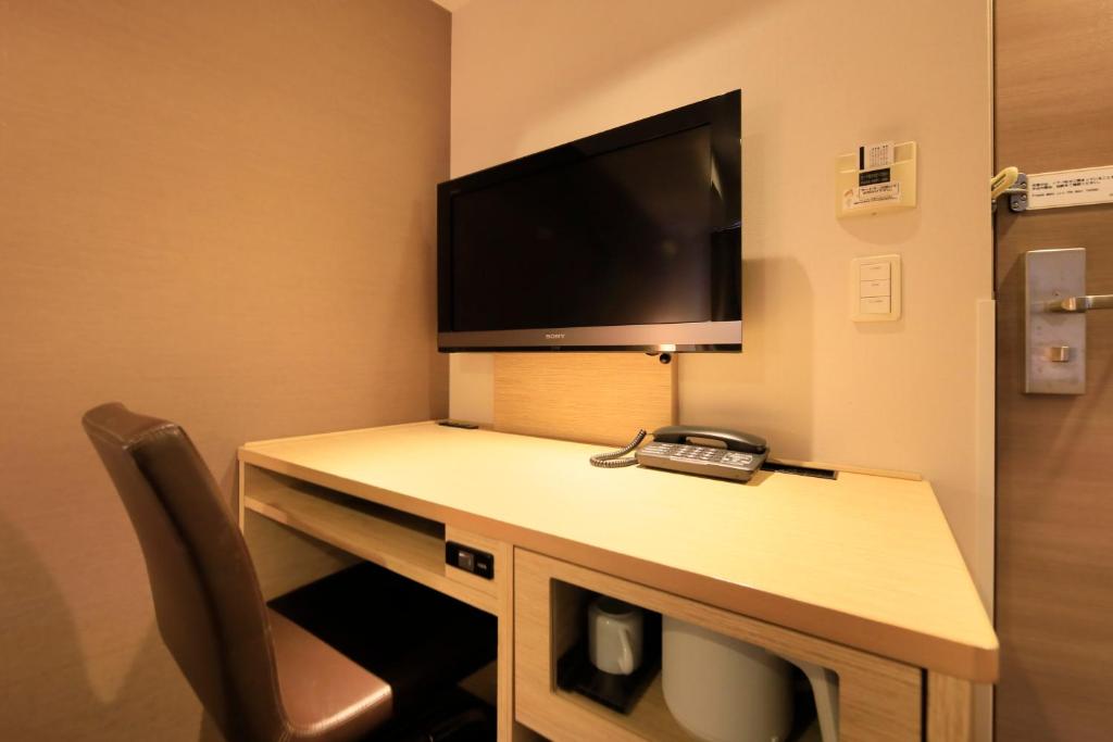 TV a/nebo společenská místnost v ubytování Via Inn Akihabara