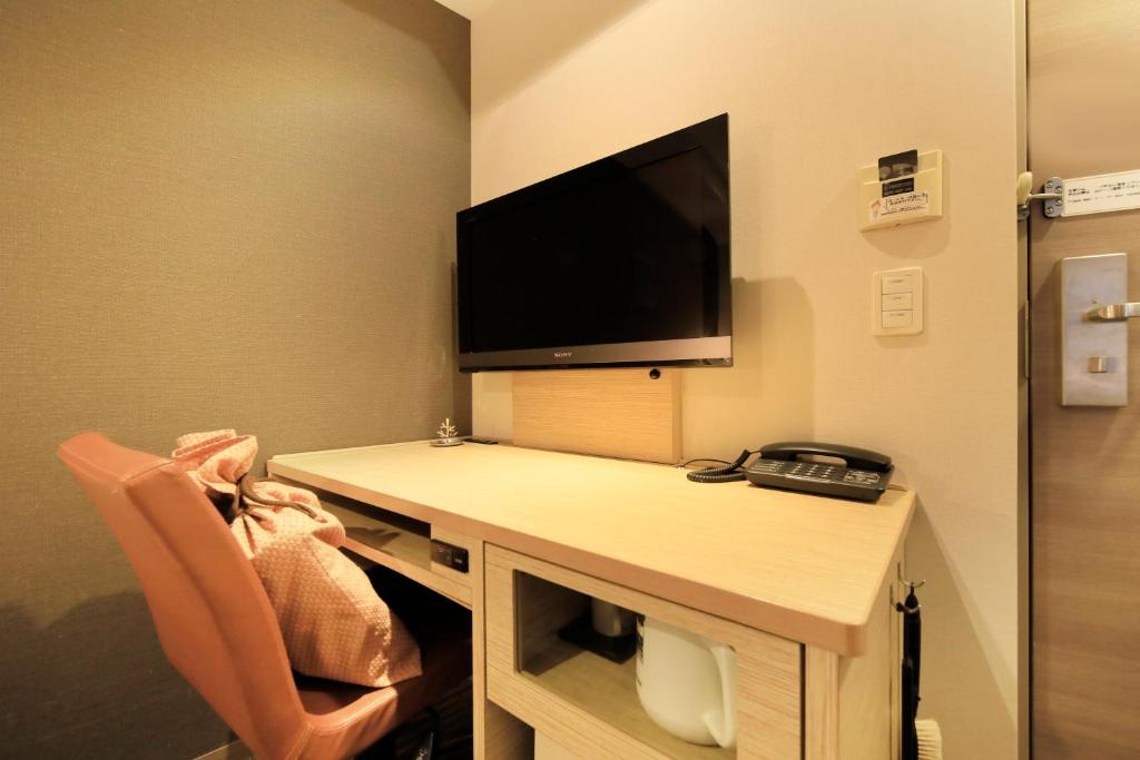 TV a/nebo společenská místnost v ubytování Via Inn Akihabara