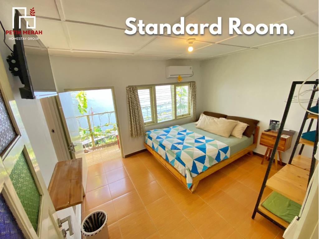 a bedroom with a bed in a room at Petik Merah Homestay in Yogyakarta