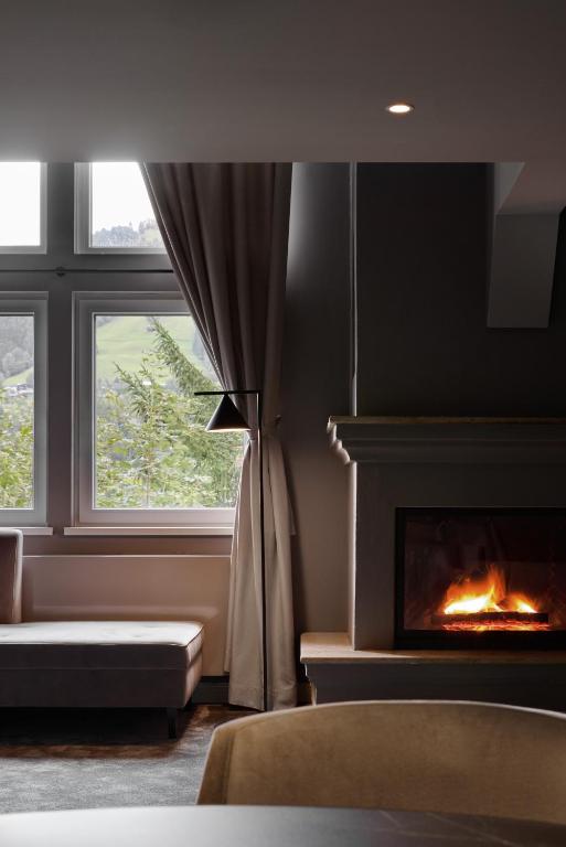 ERIKA Boutiquehotel Kitzbühelにあるベッド