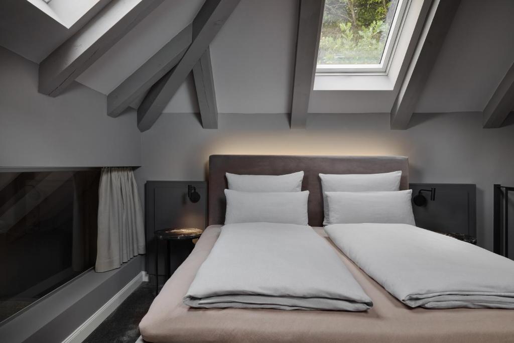 ERIKA Boutiquehotel Kitzbühelにあるベッド