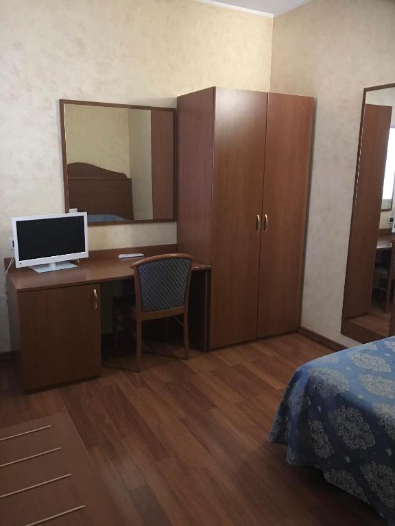 TV a/nebo společenská místnost v ubytování Hotel Rigolfo