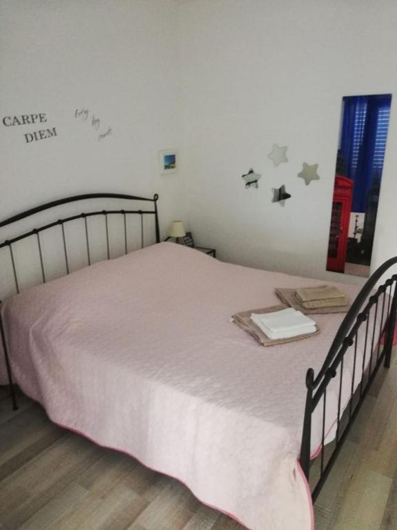 Postel nebo postele na pokoji v ubytování Apartments Mirela