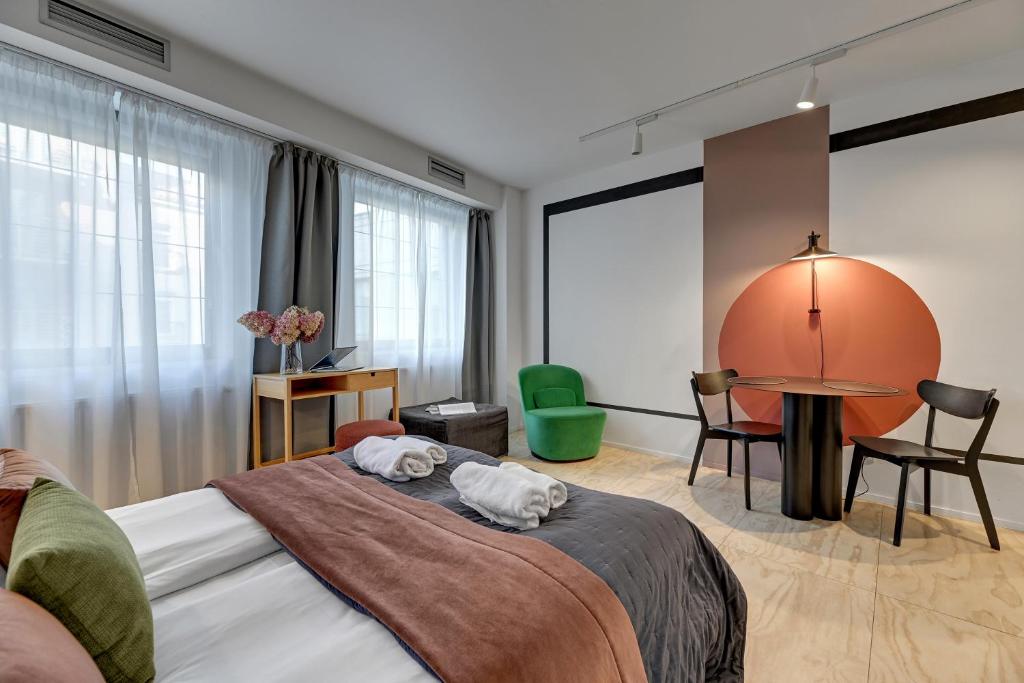 Posteľ alebo postele v izbe v ubytovaní Tartaczna City Center by Downtown Apartments