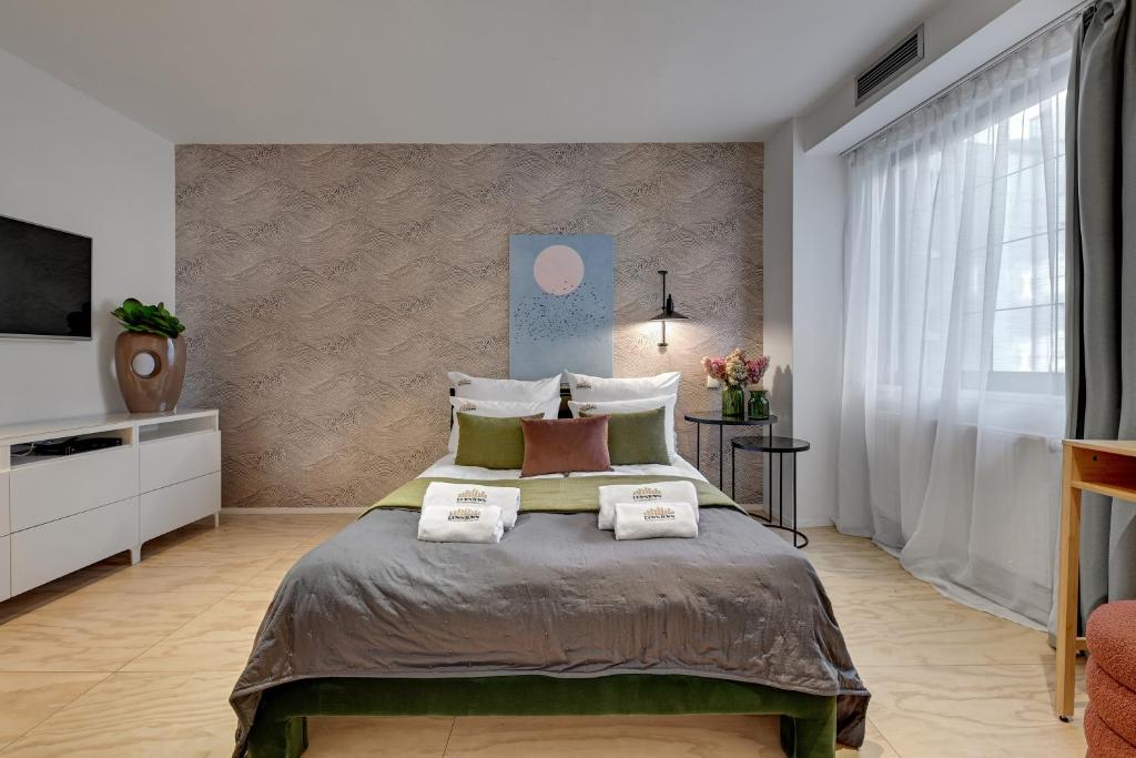 Posteľ alebo postele v izbe v ubytovaní Tartaczna City Center by Downtown Apartments