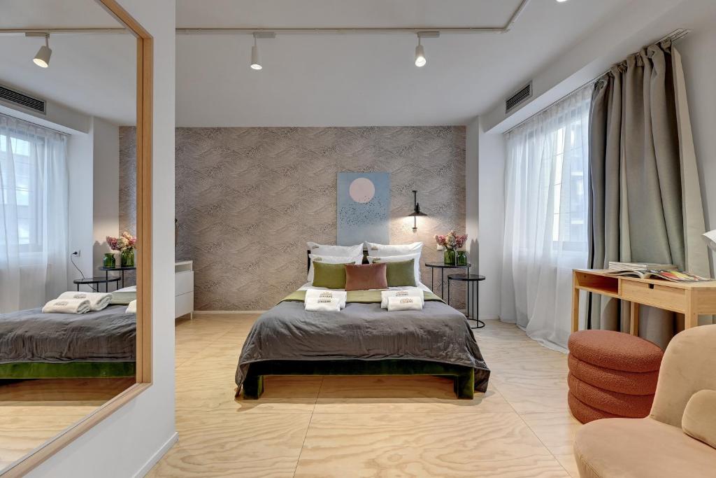 Posteľ alebo postele v izbe v ubytovaní Tartaczna City Center by Downtown Apartments