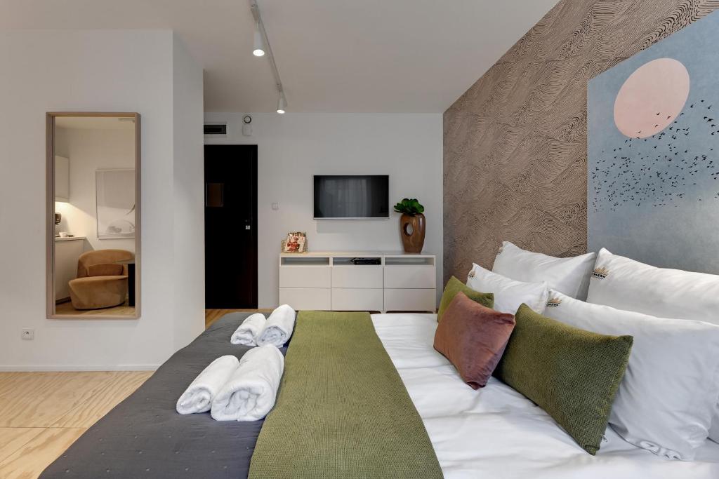 Posteľ alebo postele v izbe v ubytovaní Tartaczna City Center by Downtown Apartments