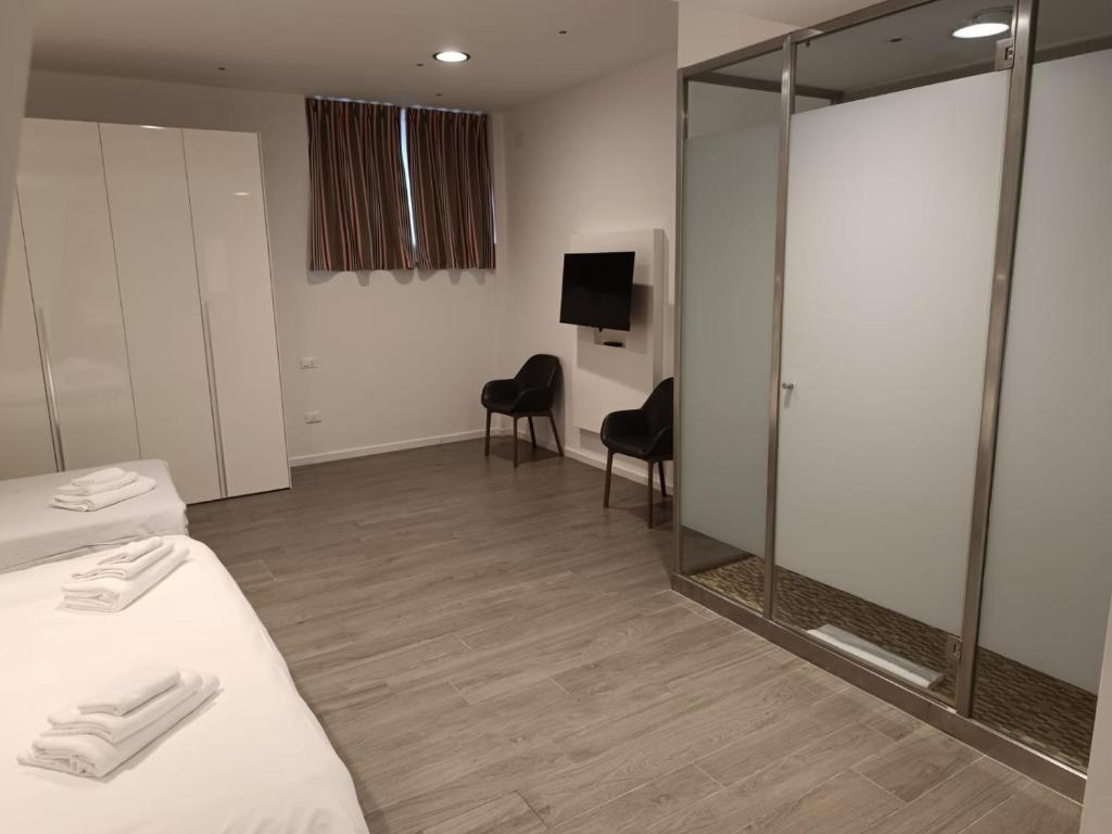 TV a/nebo společenská místnost v ubytování Fasthotel Linate