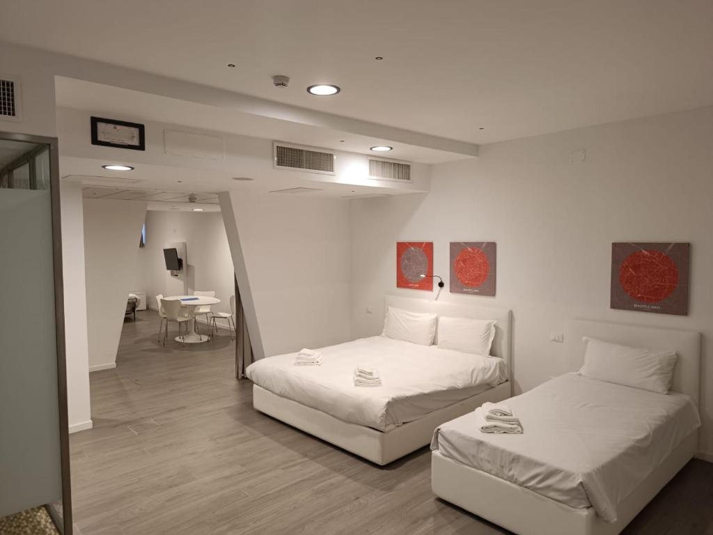 Postel nebo postele na pokoji v ubytování Fasthotel Linate