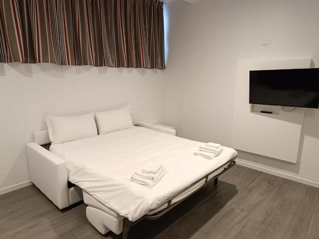 Postel nebo postele na pokoji v ubytování Fasthotel Linate