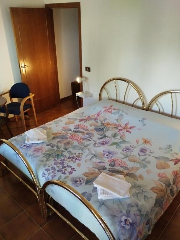 Postel nebo postele na pokoji v ubytování Rasna Heart Guest House