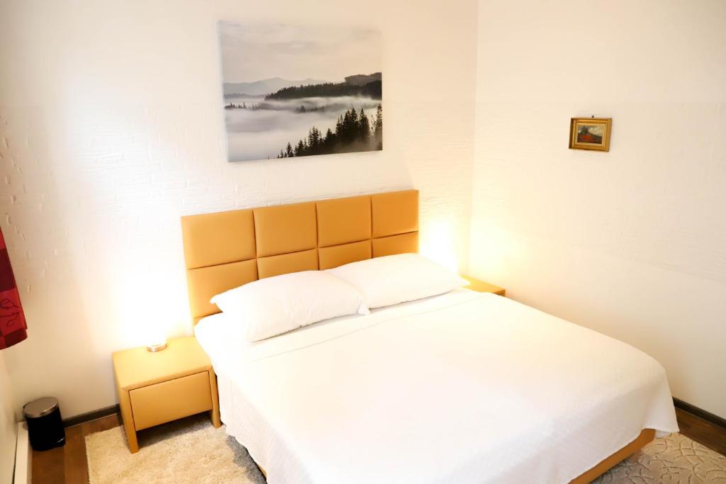 Posteľ alebo postele v izbe v ubytovaní «Go West» guest rooms
