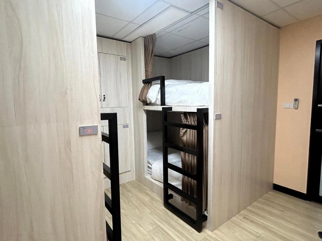 Postel nebo postele na pokoji v ubytování OD Hostel