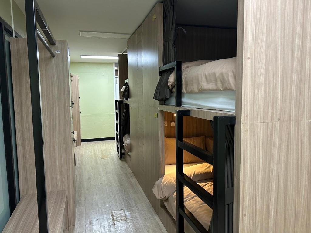 Postel nebo postele na pokoji v ubytování OD Hostel