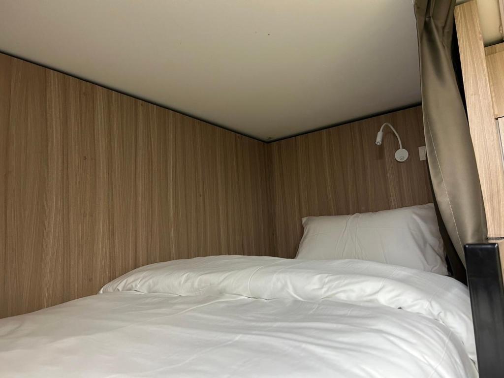 Postel nebo postele na pokoji v ubytování OD Hostel