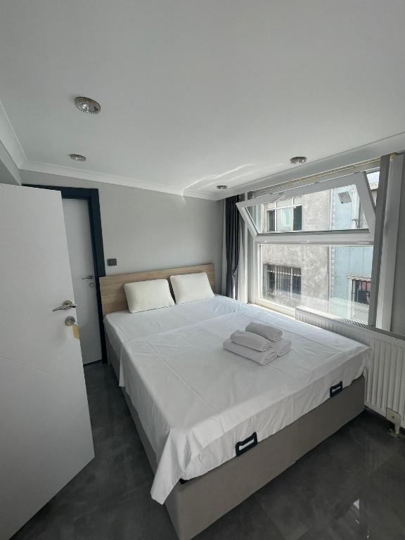 Postel nebo postele na pokoji v ubytování moonlight hotel