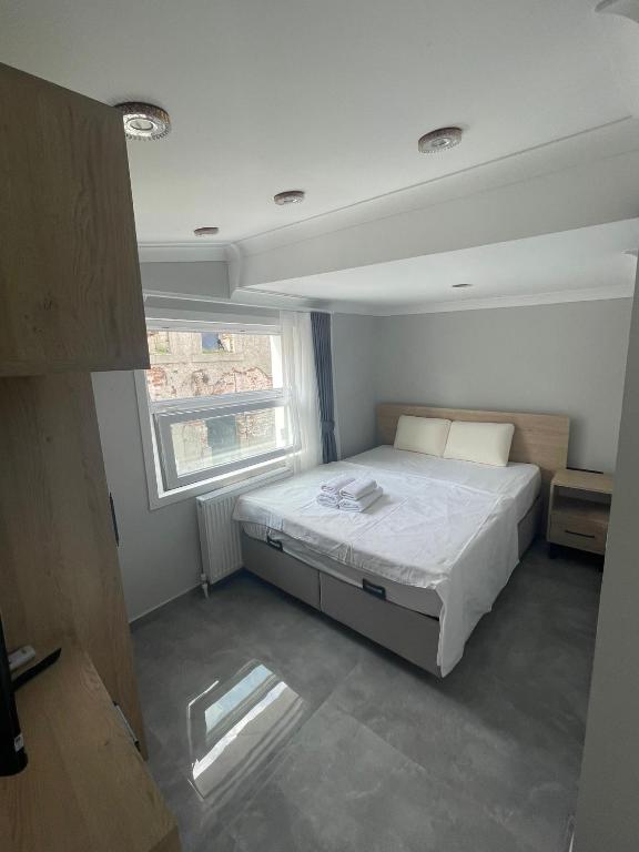 Postel nebo postele na pokoji v ubytování moonlight hotel