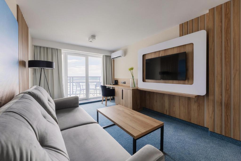 TV a/nebo společenská místnost v ubytování Porta Mare Active & Spa Resort