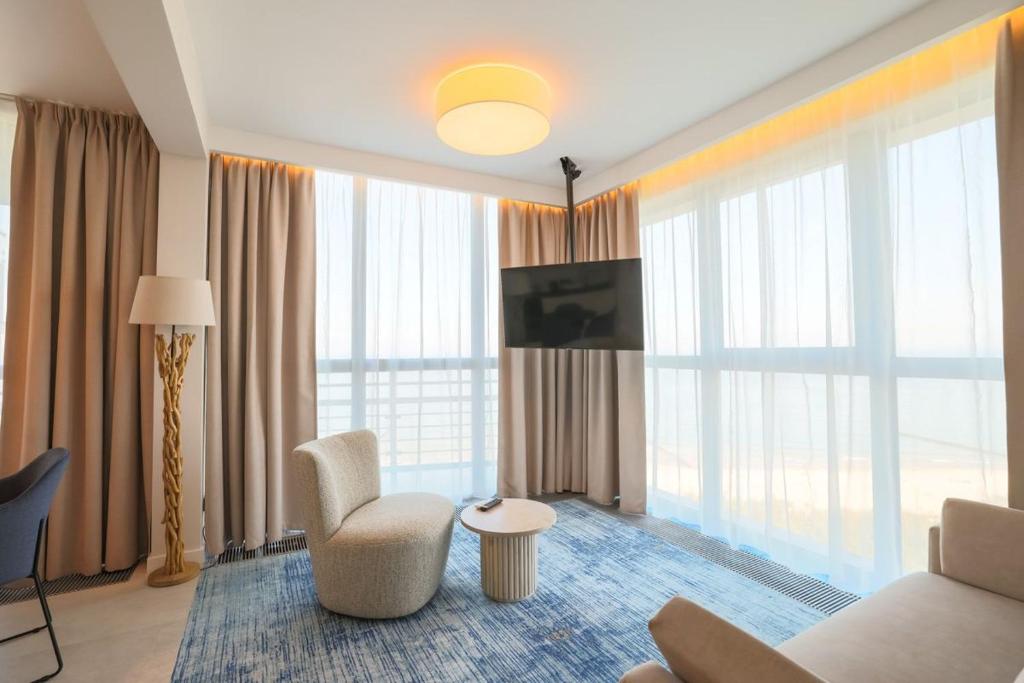 TV a/nebo společenská místnost v ubytování Porta Mare Active & Spa Resort