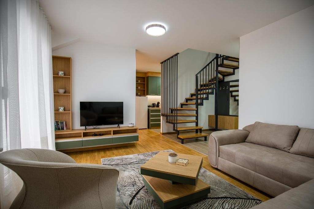 TV a/nebo společenská místnost v ubytování TOP VIEW apartment 44