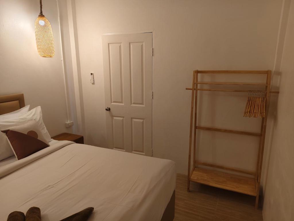 En eller flere senger på et rom på Seaview Home Samet