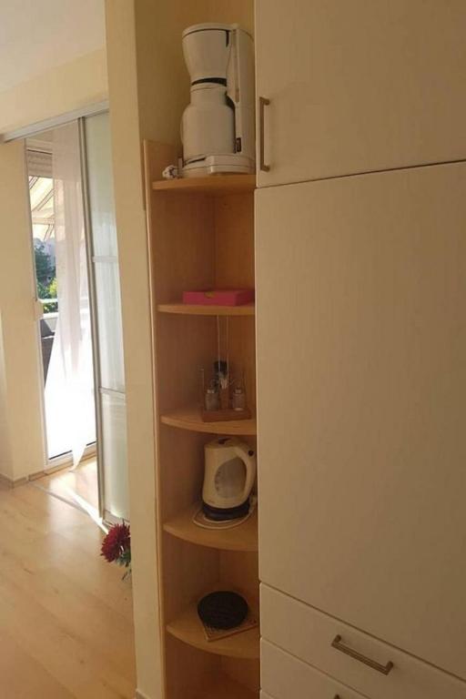 Kuchyň nebo kuchyňský kout v ubytování Apartments JaVi
