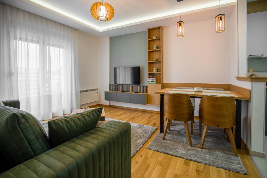 TV a/nebo společenská místnost v ubytování TOP VIEW apartment 46