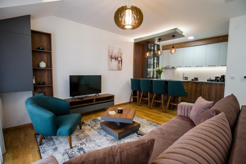 TV a/nebo společenská místnost v ubytování TOP VIEW apartment 47