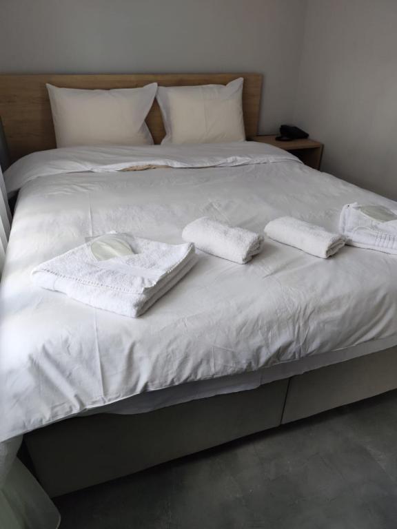 Postel nebo postele na pokoji v ubytování moonlight hotel