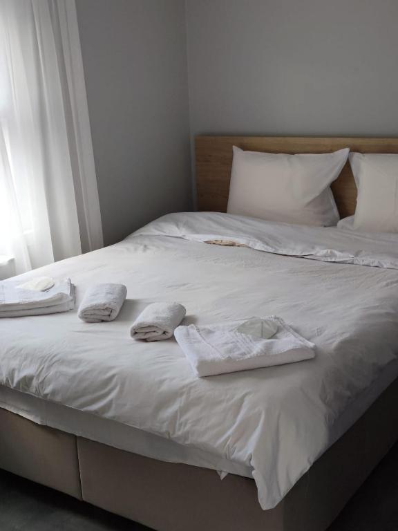 Postel nebo postele na pokoji v ubytování moonlight hotel