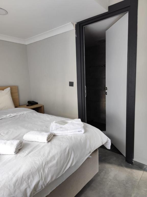Postel nebo postele na pokoji v ubytování moonlight hotel