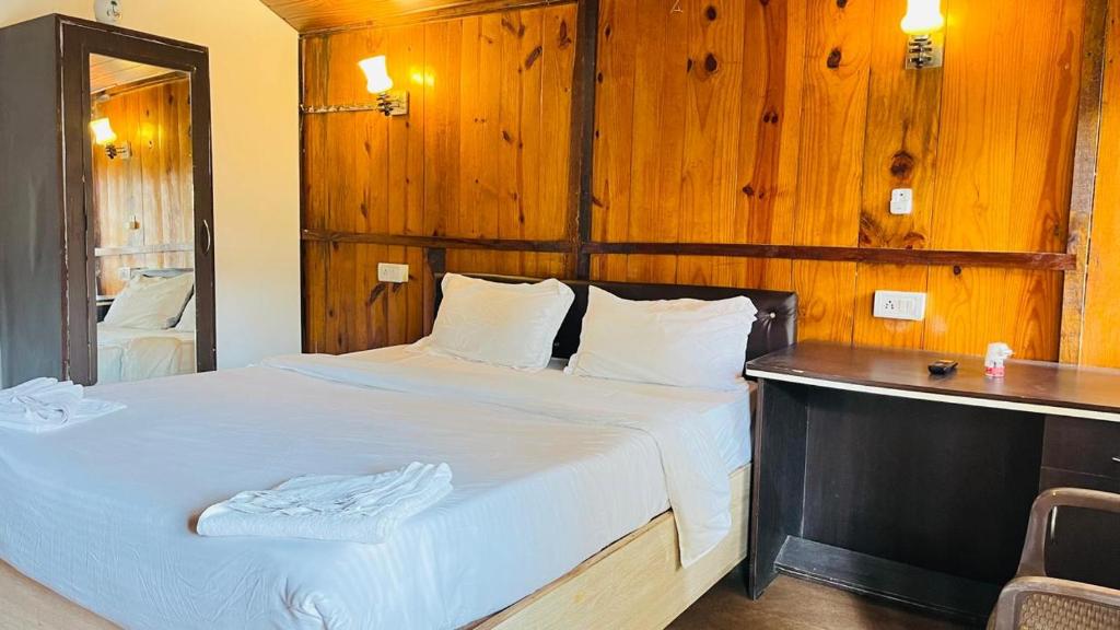 Postel nebo postele na pokoji v ubytování Sameer beachfront Cottages