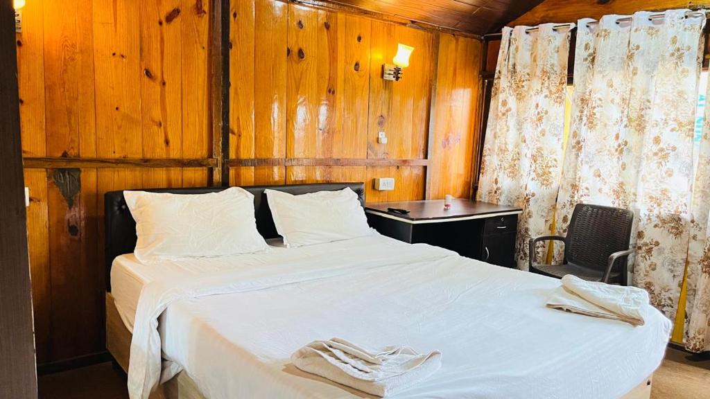 Postel nebo postele na pokoji v ubytování Sameer beachfront Cottages