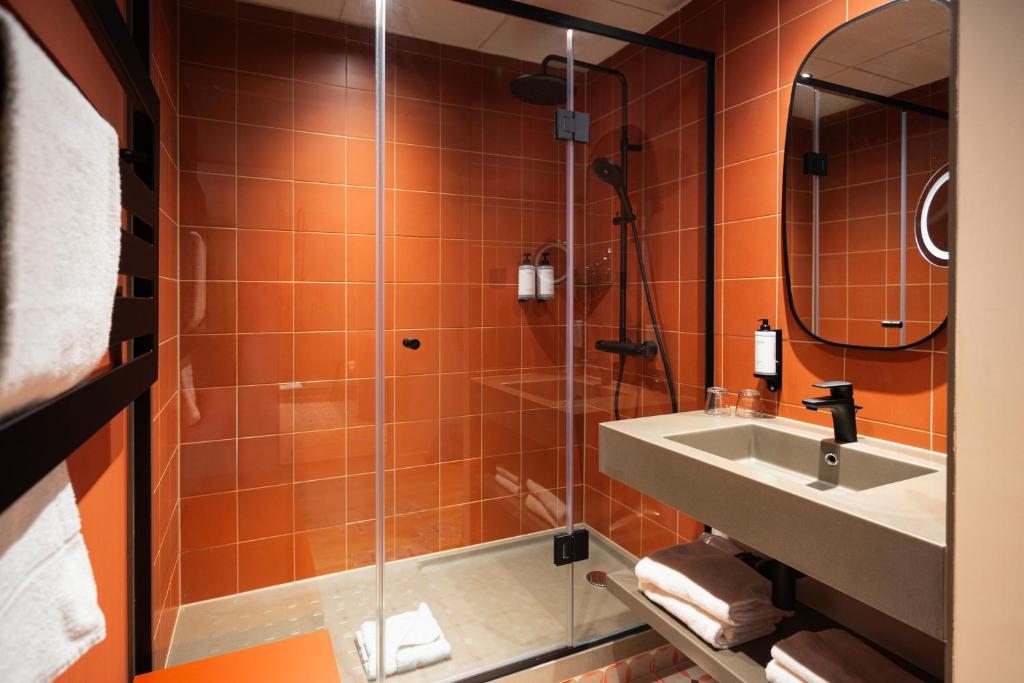 Koupelna v ubytování Hotel L'Europe