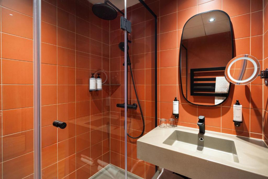 Koupelna v ubytování Hotel L'Europe