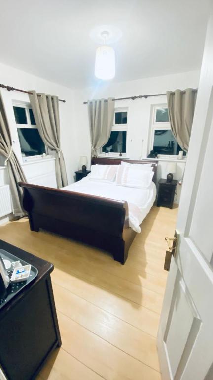 Postel nebo postele na pokoji v ubytování Sonas House