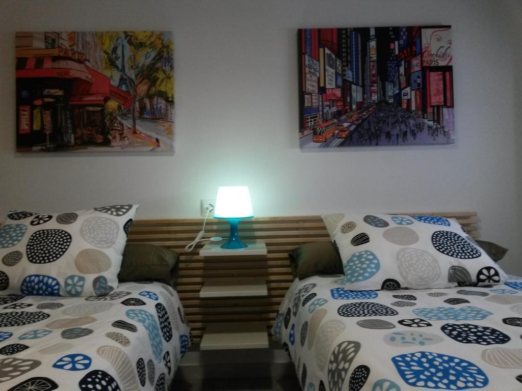 Łóżko lub łóżka w pokoju w obiekcie Apartamento Oropendola 9